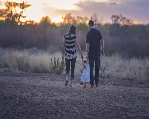 Indian family enjoying an evening stroll together